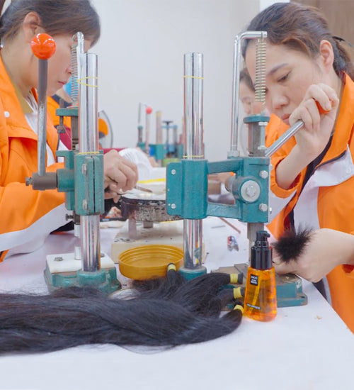 Making hair extensions at the factory